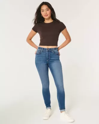 Jeans super skinny a vita alta e lavaggio scuro con effetto curvy
