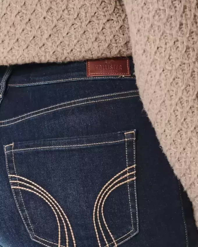 Jeans super skinny a vita alta e lavaggio scuro con effetto curvy