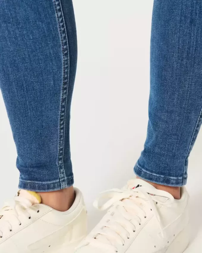 Jeans super skinny a vita alta e lavaggio scuro con effetto curvy