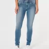 Jeans super skinny a vita bassa con lavaggio medio