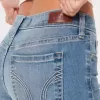Jeans super skinny a vita bassa con lavaggio medio