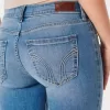 Jeans super skinny a vita bassa e lavaggio medio con effetto curvy