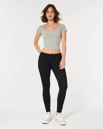 Jeans super skinny neri a vita bassa e curvy
