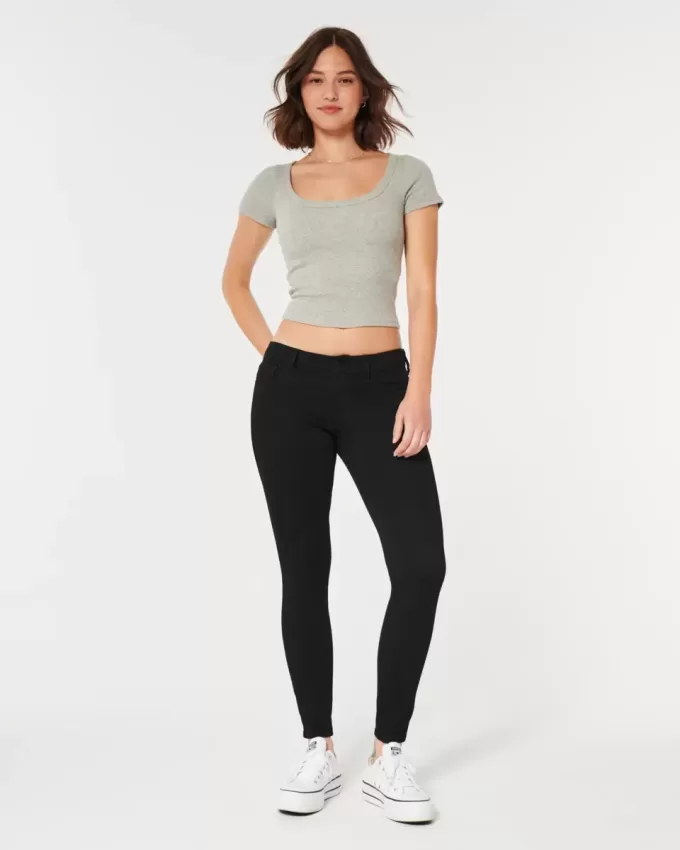 Jeans super skinny neri a vita bassa e curvy