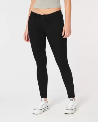 Jeans super skinny neri a vita bassa e curvy