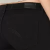 Jeans super skinny neri a vita bassa e curvy