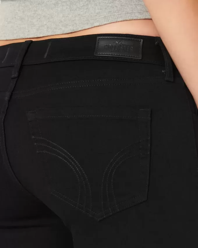 Jeans super skinny neri a vita bassa e curvy