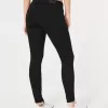 Jeans super skinny neri a vita bassa e curvy