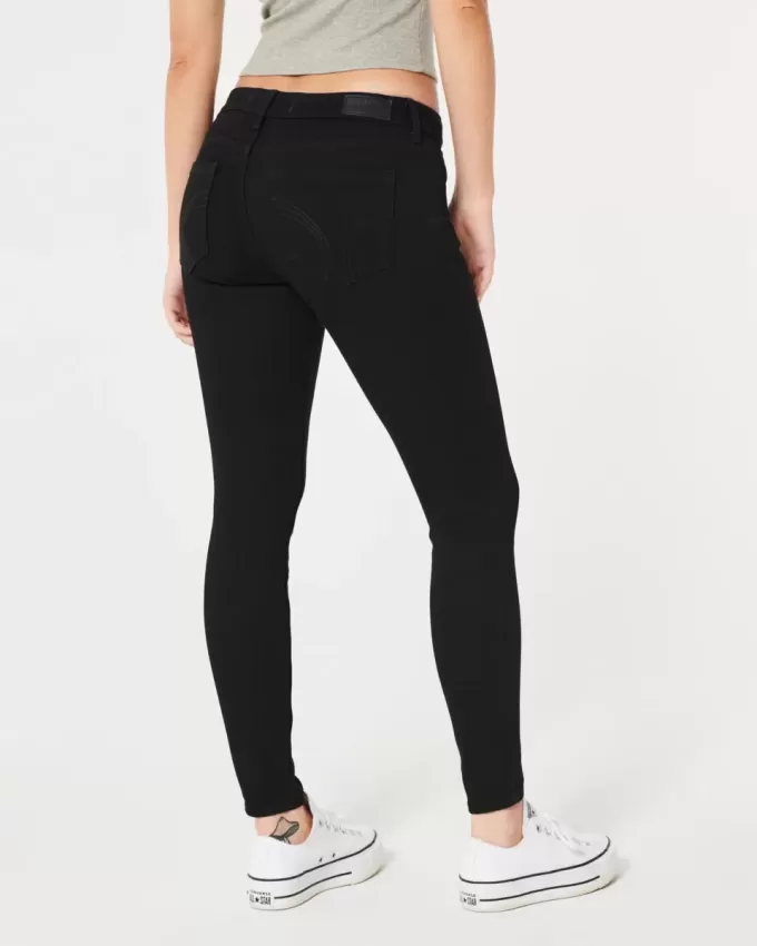 Jeans super skinny neri a vita bassa e curvy
