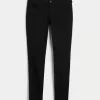 Jeans super skinny neri a vita bassa e curvy