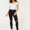 Jeans super skinny neri strappati a vita alta