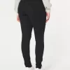 Jeans super skinny neri strappati a vita alta