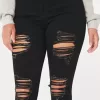 Jeans super skinny neri strappati a vita alta