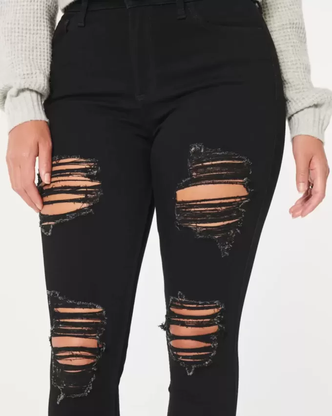 Jeans super skinny neri strappati a vita alta