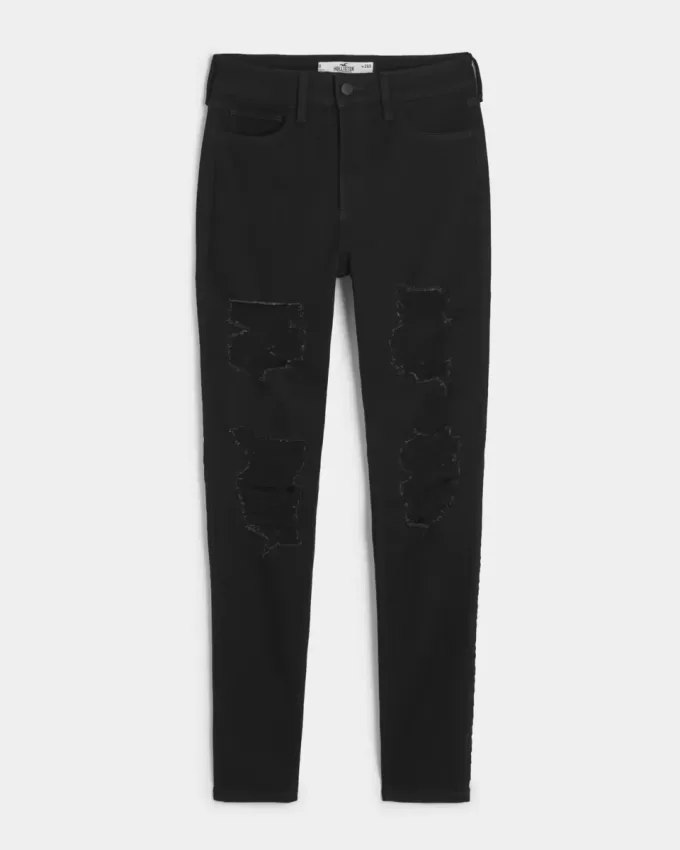 Jeans super skinny neri strappati a vita alta