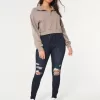 Leggings in jeans strappati e lavaggio scuro a vita alta