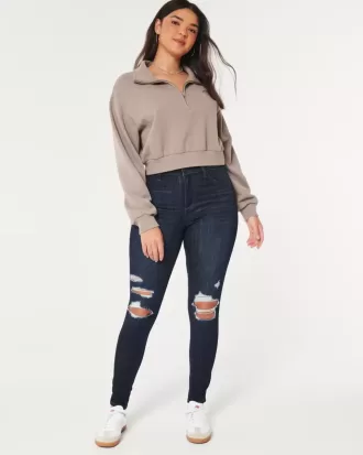 Leggings in jeans strappati e lavaggio scuro a vita alta