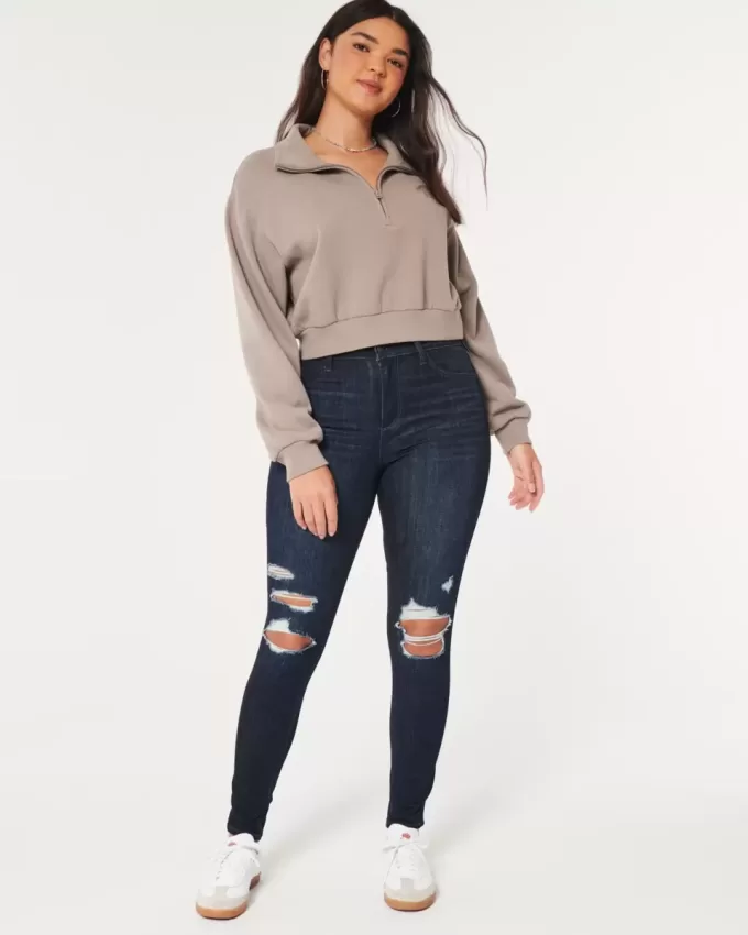 Leggings in jeans strappati e lavaggio scuro a vita alta