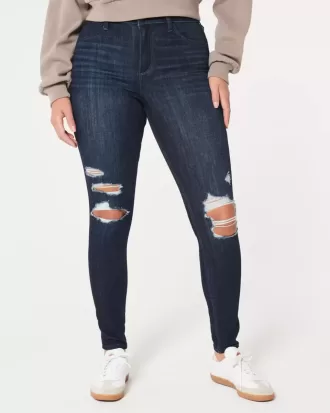 Leggings in jeans strappati e lavaggio scuro a vita alta