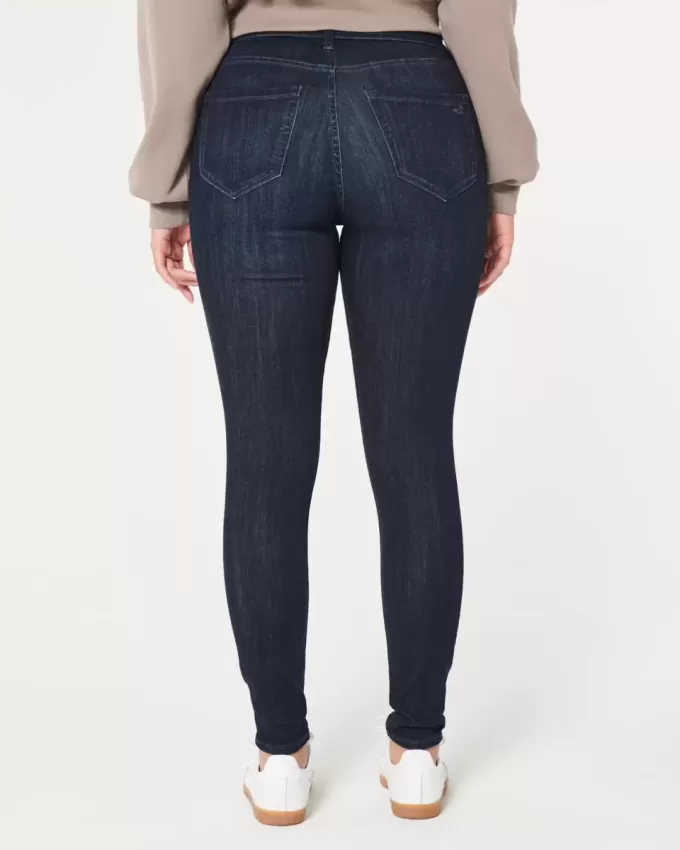 Leggings in jeans strappati e lavaggio scuro a vita alta