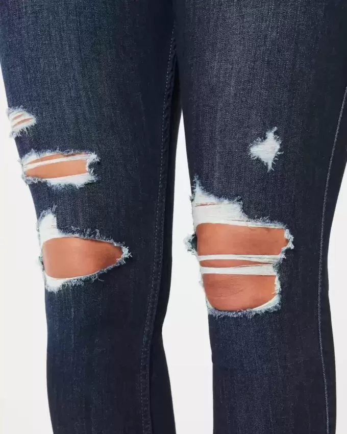 Leggings in jeans strappati e lavaggio scuro a vita alta