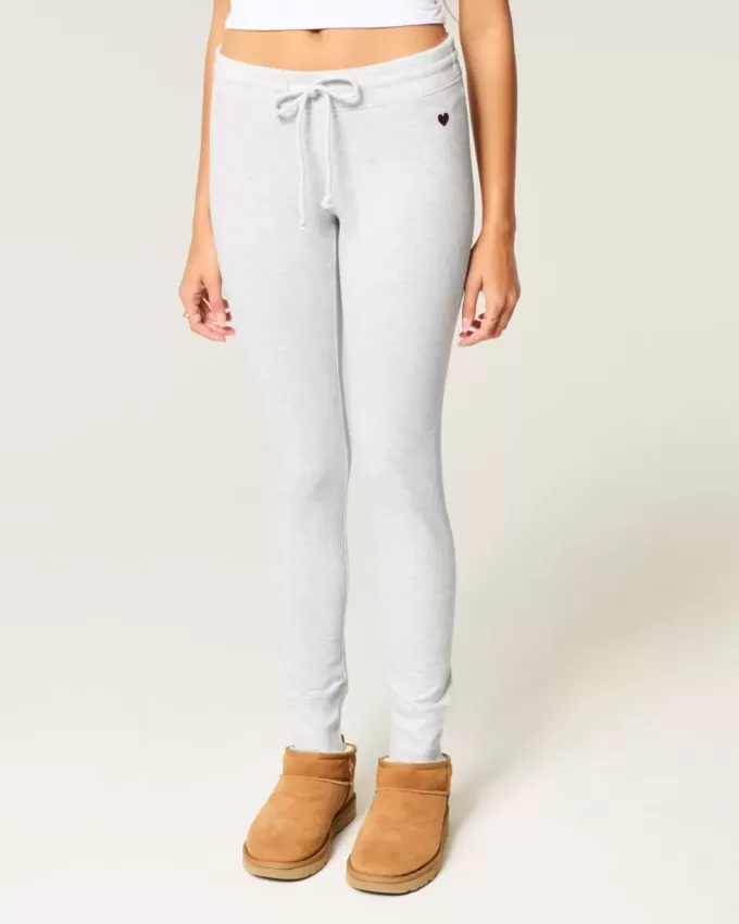 Leggings in pile con grafica a cuore