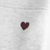 Leggings in pile con grafica a cuore