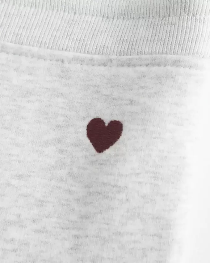 Leggings in pile con grafica a cuore