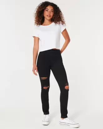 Leggings neri strappati a vita alta