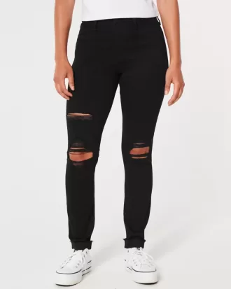 Leggings neri strappati a vita alta