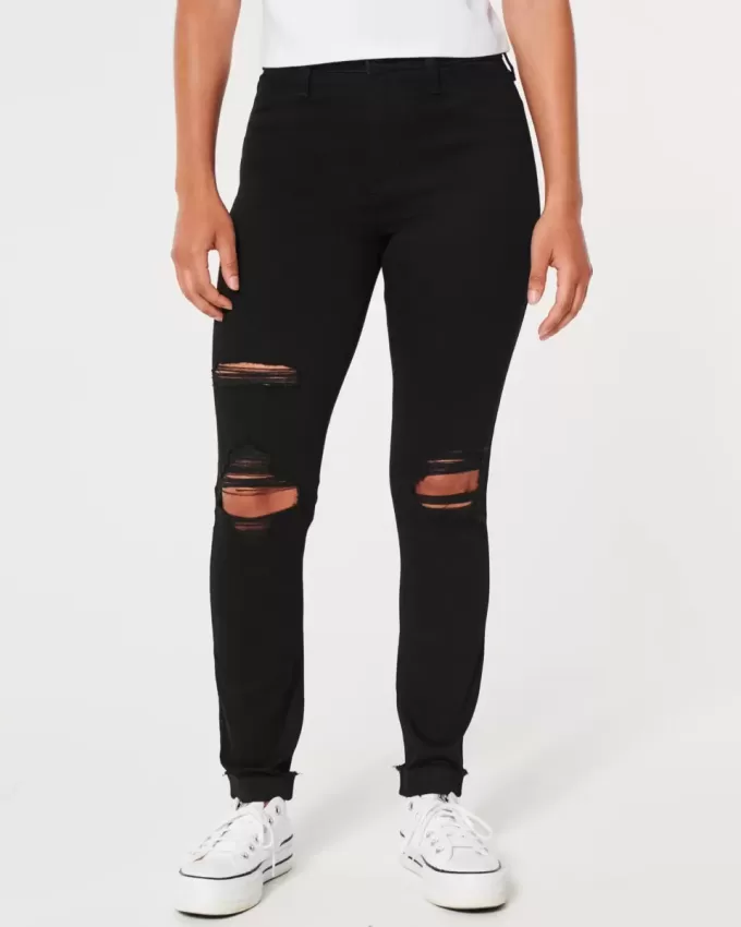 Leggings neri strappati a vita alta