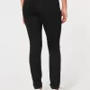 Leggings neri strappati a vita alta