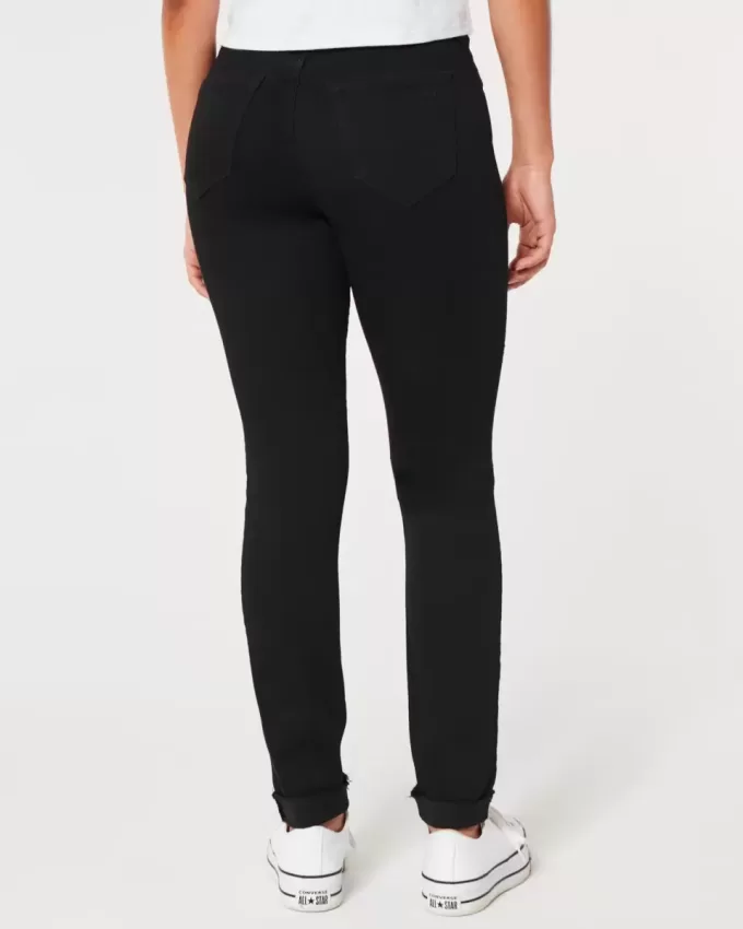 Leggings neri strappati a vita alta