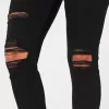 Leggings neri strappati a vita alta