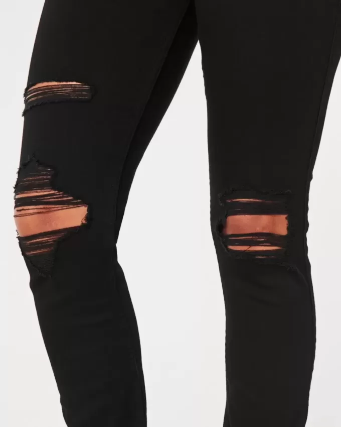 Leggings neri strappati a vita alta
