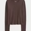 Maglia girocollo a maniche lunghe in tessuto senza cuciture Maglia girocollo a maniche lunghe in tessuto senza cuciture