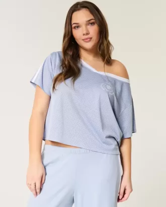 Maglia grafica oversize con spalle scoperte