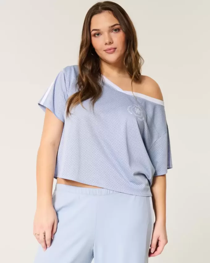 Maglia grafica oversize con spalle scoperte
