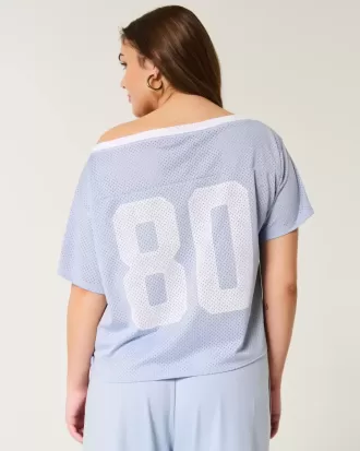 Maglia grafica oversize con spalle scoperte