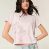 Maglietta con grafica floreale e laccetto da annodare sul retro Maglietta con grafica floreale e laccetto da annodare sul retro