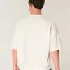 Maglietta da football con grafica Varsity, modello Baggy Crop e pesante
