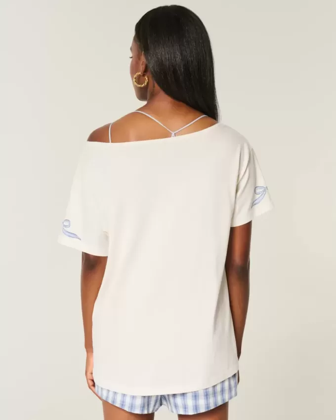 Maglietta grafica oversize con spalle scoperte