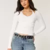 Maglione a maniche lunghe con laccetti Maglione a maniche lunghe con laccetti
