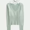 Maglione a maniche lunghe con laccetti Maglione a maniche lunghe con laccetti