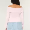 Maglione a spalle scoperte Maglione a spalle scoperte