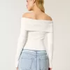 Maglione a spalle scoperte