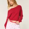 Maglione a spalle scoperte con motivo a cuore Maglione a spalle scoperte con motivo a cuore