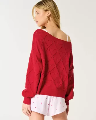 Maglione a spalle scoperte con motivo a cuore