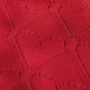 Maglione a spalle scoperte con motivo a cuore Maglione a spalle scoperte con motivo a cuore