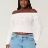 Maglione a spalle scoperte in stile uncinetto Maglione a spalle scoperte in stile uncinetto